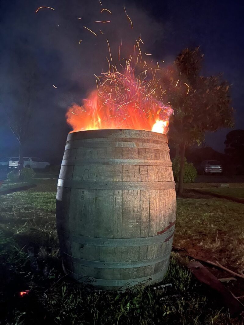Barrel with fire and sparks bursting from the top